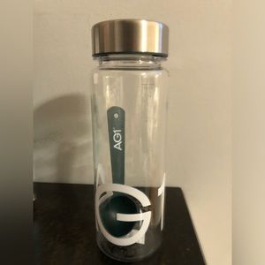 Athletic Greens (AG1) Bottle & Scoop.